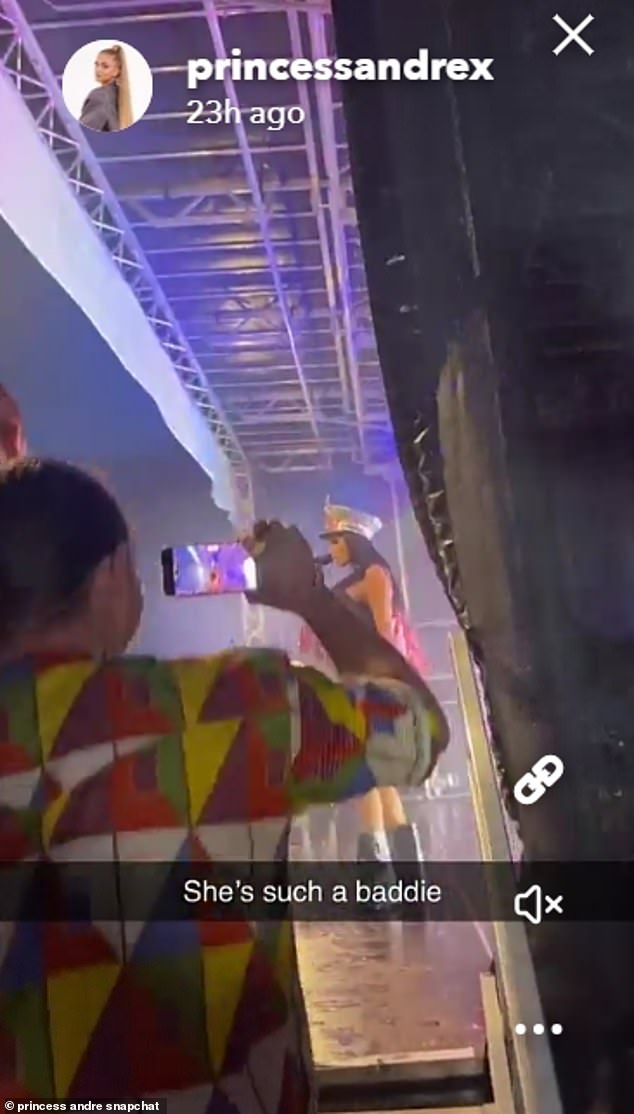 The influencer filmed from the side of stage as her mum performed, writing: 'She's such a baddie'