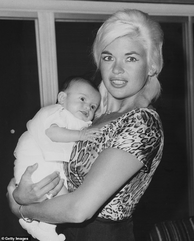 Her late mother passed away in a tragic car accident at the age of 34 , when Hargitay was just three years old, in June 1967; Jayne pictured holding six-weeks old baby Mariska in 1964