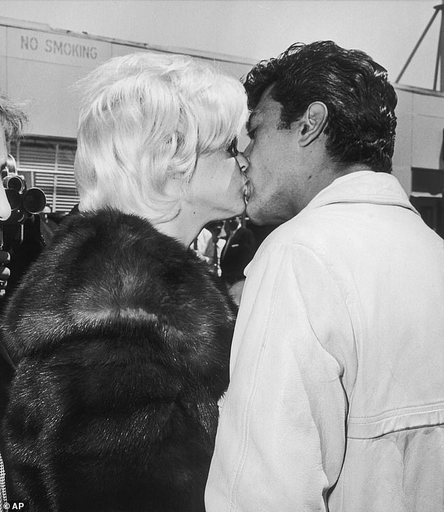 Mariska told Vanity Fair she went to see Sardelli perform in Atlantic City when she was 30 years old and introduced herself to him as his daughter, and he told her he'd been 'waiting 30 years for this moment'; Jayne pictured kissing Nelson