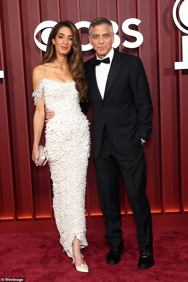 George Clooney is competing for his massively successful play Good Night, And Good Luck in the lead actor in a play category; pictured with wife Amal Clooney