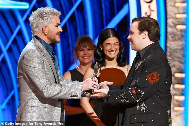 He received the award from Adam Lambert and Charli D'Amelio