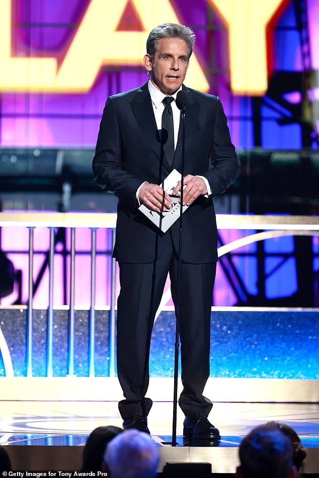 They were presented the award by actor Ben Stiller