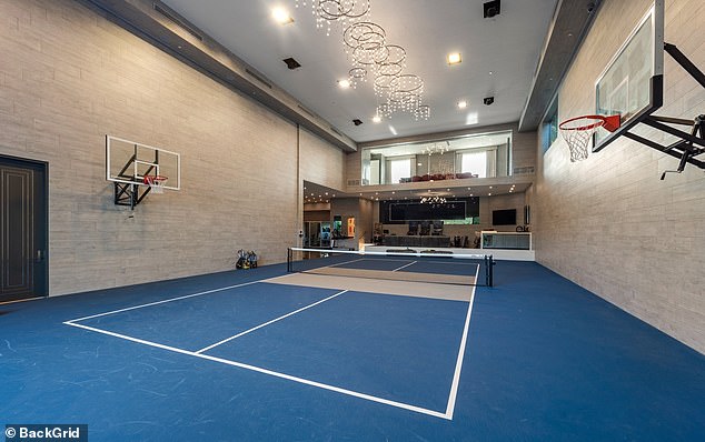 The mansion also features a pickleball court and basketball court, along with a home bar, gym, sports lounge, and boxing ring