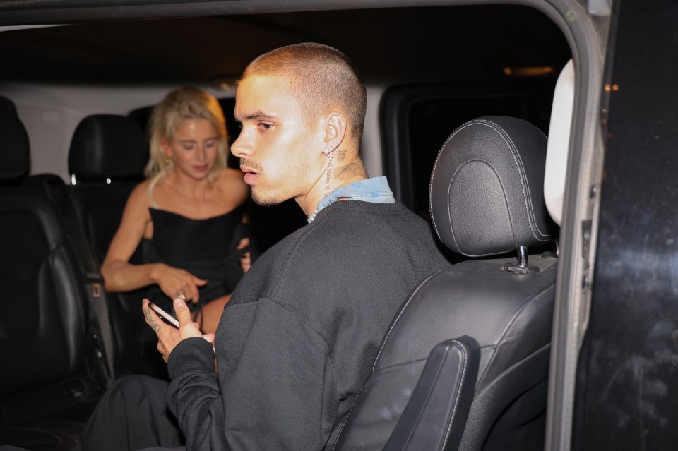 Romeo Beckham and Caroline Daur leaving a party in Paris.