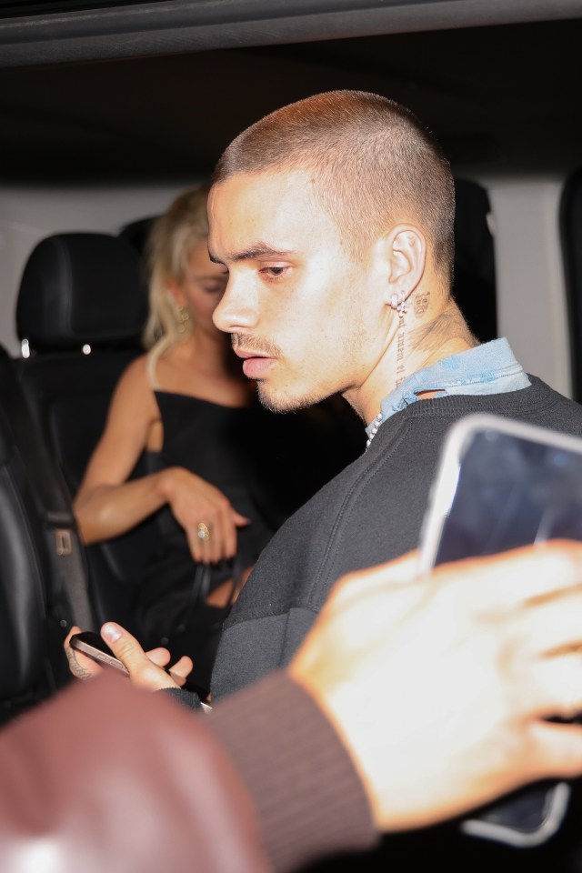 Romeo Beckham and Caroline Daur leaving a party in Paris.