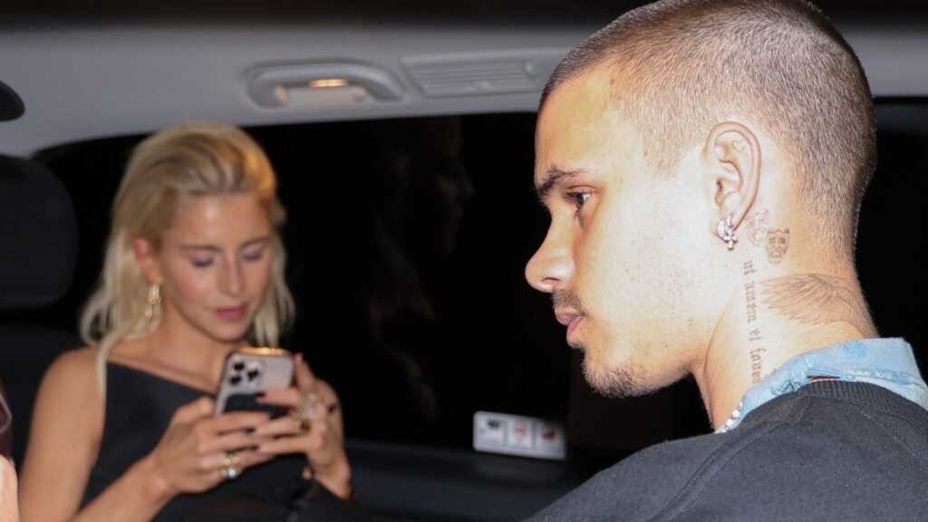 Romeo Beckham, 22, sparks romance rumours with German model Caroline Daur, 30, in Paris as they leave hotel after party