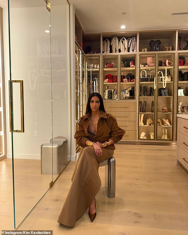 Kim sat for this portrait as she wore a suede jacket and long skirt