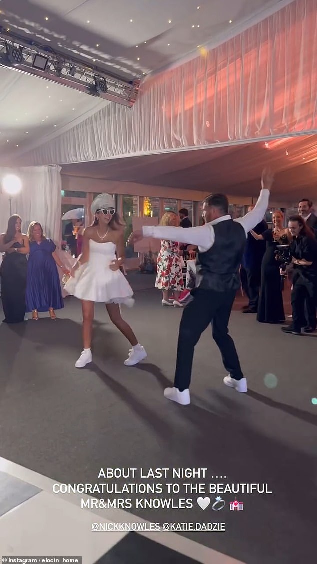 In another clip, the couple showed off their dances moves while Katie jokingly shook her head at her new husband's moves as he whipped off his pink suit jacket flinging it around his head