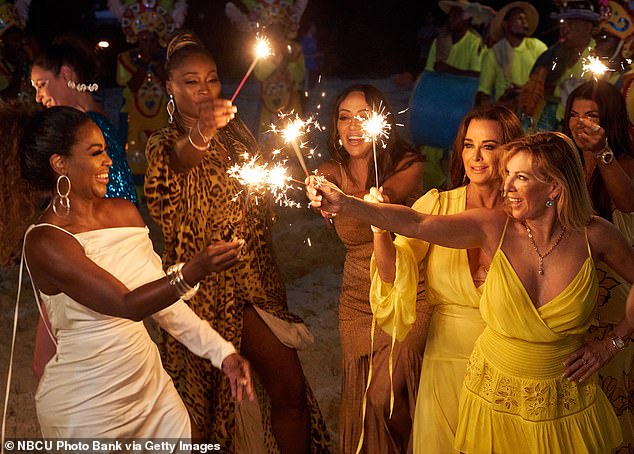 After her suspension was confirmed, Moore called out Bravo for being a 'toxic environment.' She further shut down 'revenge porn' claims on Instagram on and revealed she has 'proof' for her defense; seen far left in Real Housewives Ultimate Girls Trip