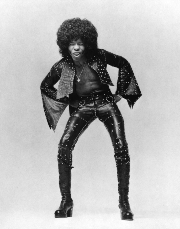 Black and white portrait of Sly Stone.