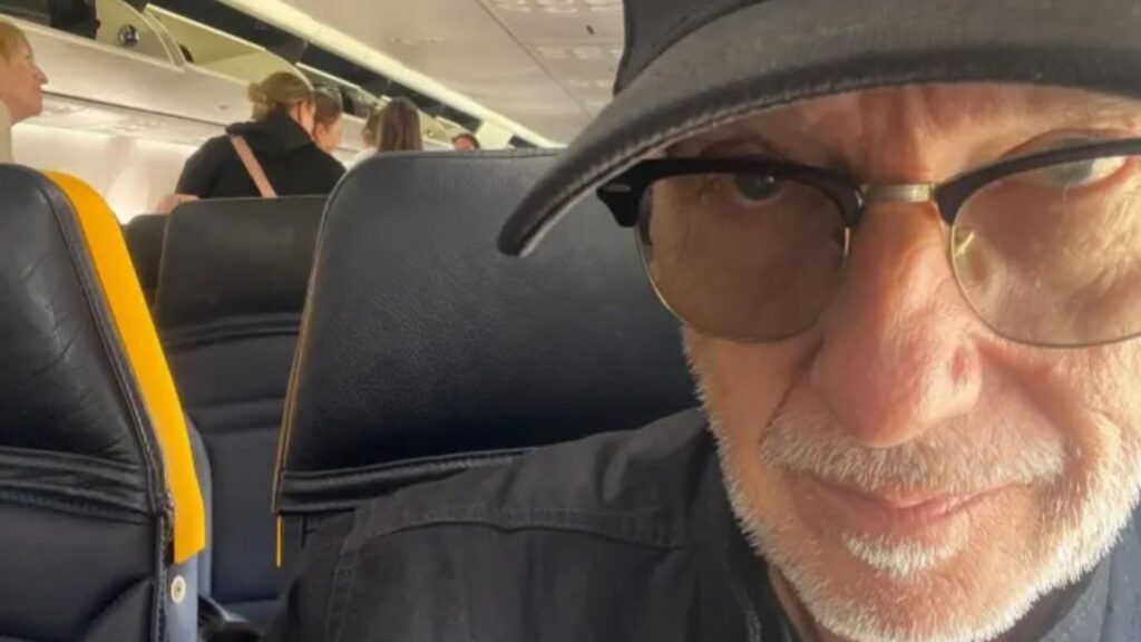 80s pop icon looks unrecognisable on RyanAir flight… can you tell who it is?
