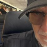 80s pop icon looks unrecognisable on RyanAir flight… can you tell who it is?