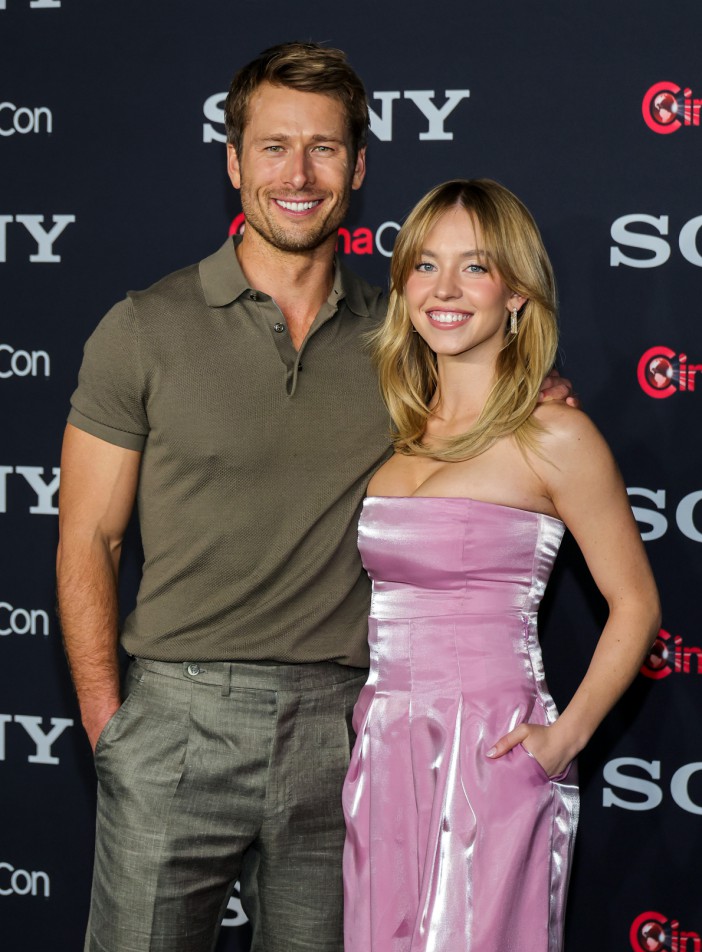 LAS VEGAS, NEVADA - APRIL 24: Glen Powell (L) and Sydney Sweeney promote the upcoming film "Anyone But You" at the Sony Pictures Entertainment presentation during CinemaCon, the official convention of the National Association of Theatre Owners, at The Colosseum at Caesars Palace on April 24, 2023 in Las Vegas, Nevada. (Photo by Ethan Miller/Getty Images)