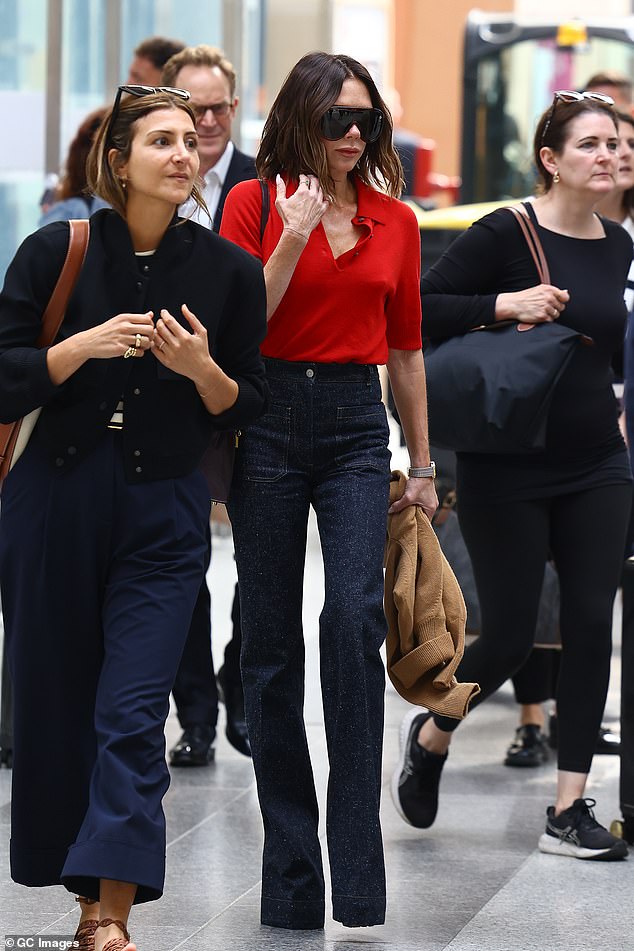 Victoria accessorised her stylish looked with oversized shades, finishing off her look with Hermes Birkin Kelly bag draped over her shoulder