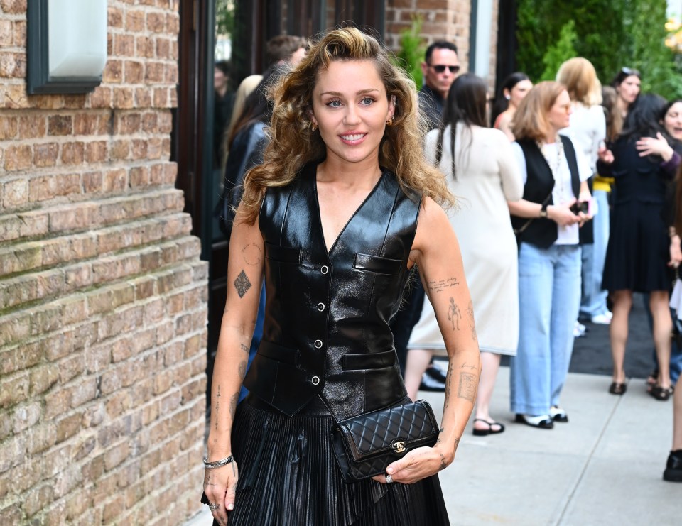 Miley Cyrus arriving at a Chanel luncheon.