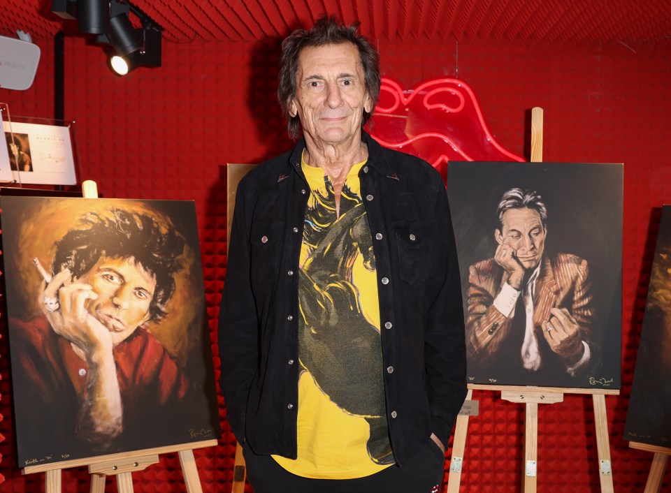 Ronnie Wood at an art exhibition featuring his paintings.