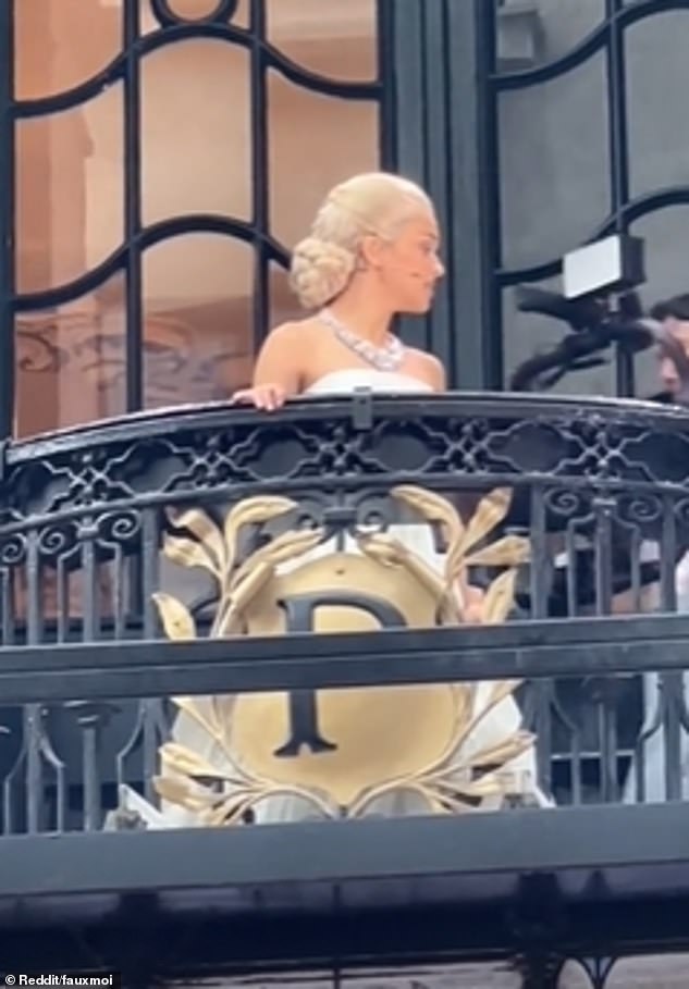 Rachel showed off her amazing voice as she belted out Madonna 's 1996 hit while looking over the balcony and a film crew captured her performance from behind