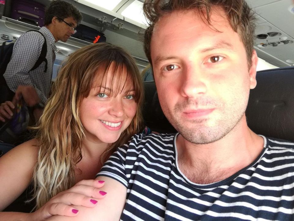 Charlotte Church and Jonathan Powell on an airplane.