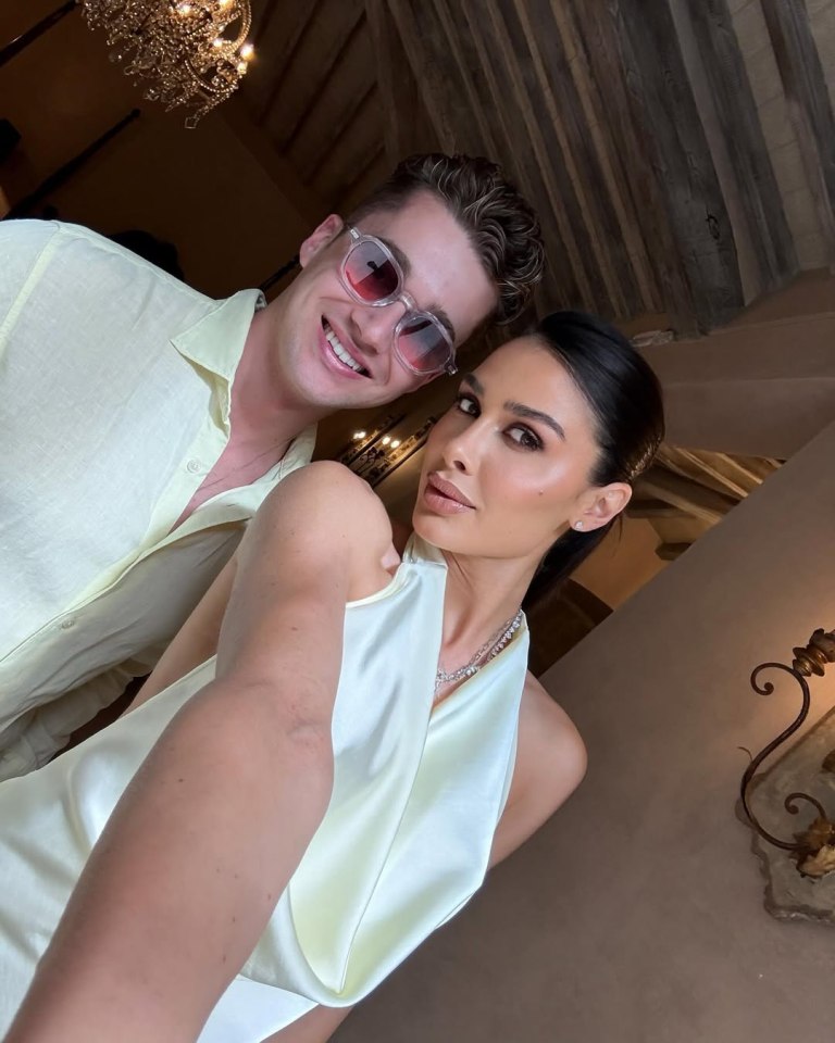 AJ Pritchard and his fiancée posing for a selfie.