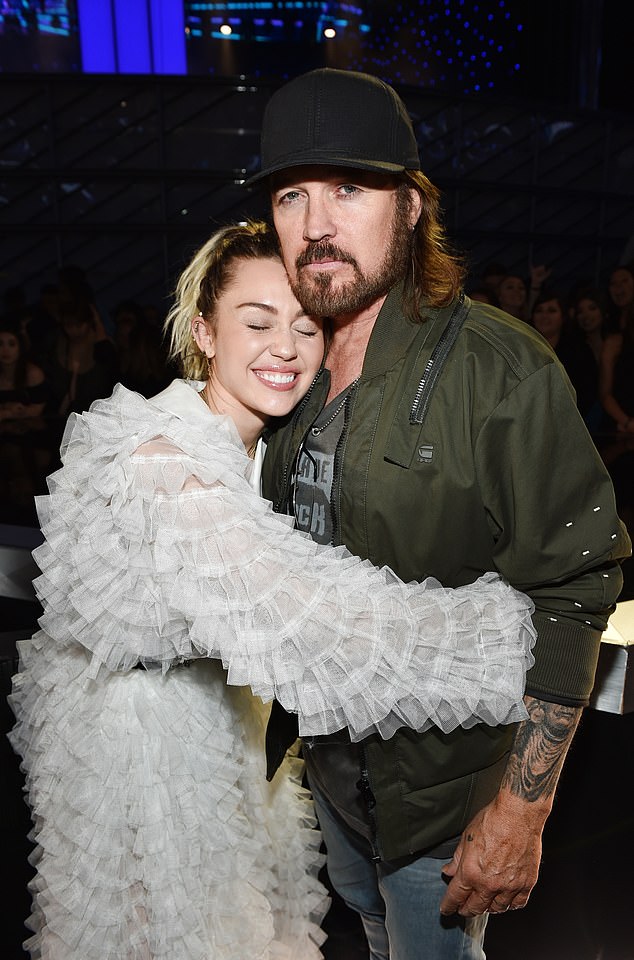 Miley Cyrus also broke her silence on her father's new relationship while talking to New York Times' The Interview podcast late last month; seen in 2017 in Las Vegas