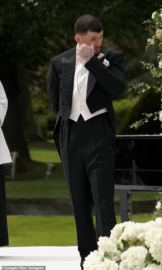 Oliver looked emotional as he shed a few tears while waiting for his bride-to-be at the end of the aisle