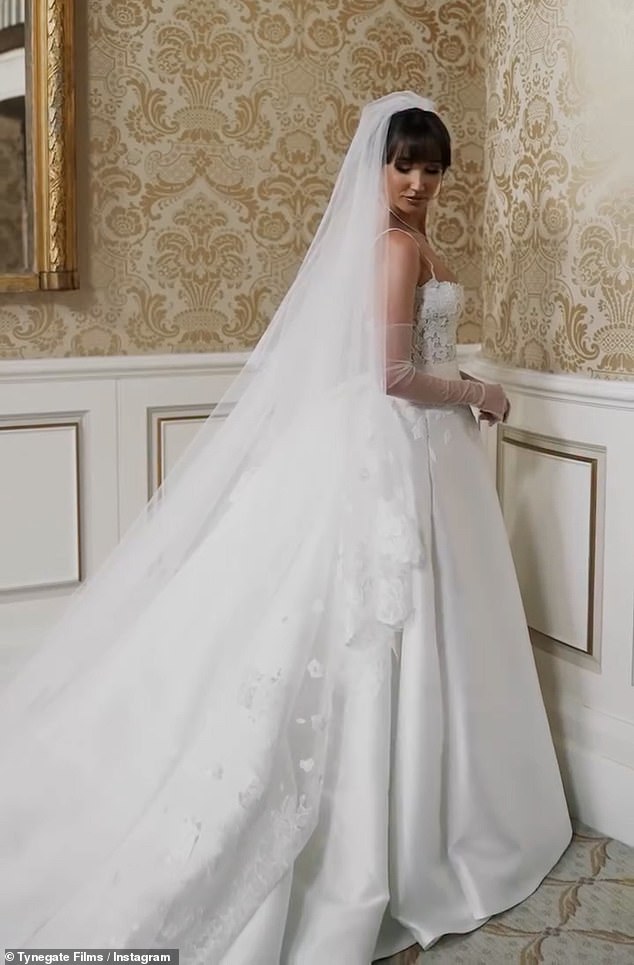 Completing the look was a long cathedral veil, softly draped and adorned with appliqués of three different French Chantilly laces, fading into a delicate degradé effect toward the centre