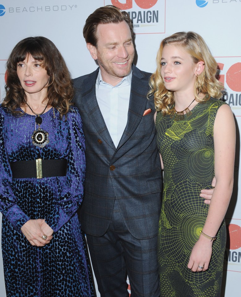 Ewan McGregor with his wife and daughter at an event.