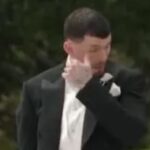Megan McKenna's footballer husband wipes away tears in new video of their fairytale wedding