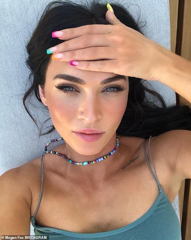 The nail artist further expressed to the outlet, 'I wanted to give her something new without going overboard. It's the perfect mix of cute and cool for summer'