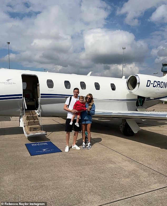 Rebecca's Instagram feed is full of glamorous photos from her exotic travels over the years with Danny - from the Seychelles to Dubai (pictured with Danny and son Albie)