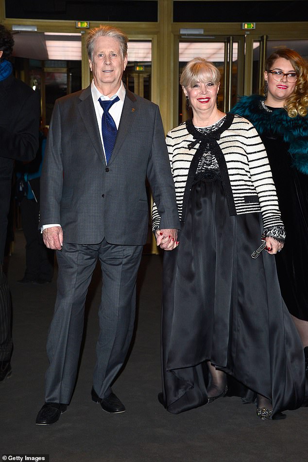 Beach Boys artist Brian Wilson, 81, said his wife Melinda Ledbetter has died at the age of 77. Wilson and Ledbetter were pictured on February 8, 2015 in Berlin, Germany
