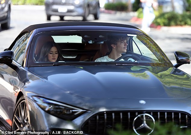 Jayden was spotted again taking his new car for a joyride - this time, with a mystery woman in the passenger seat
