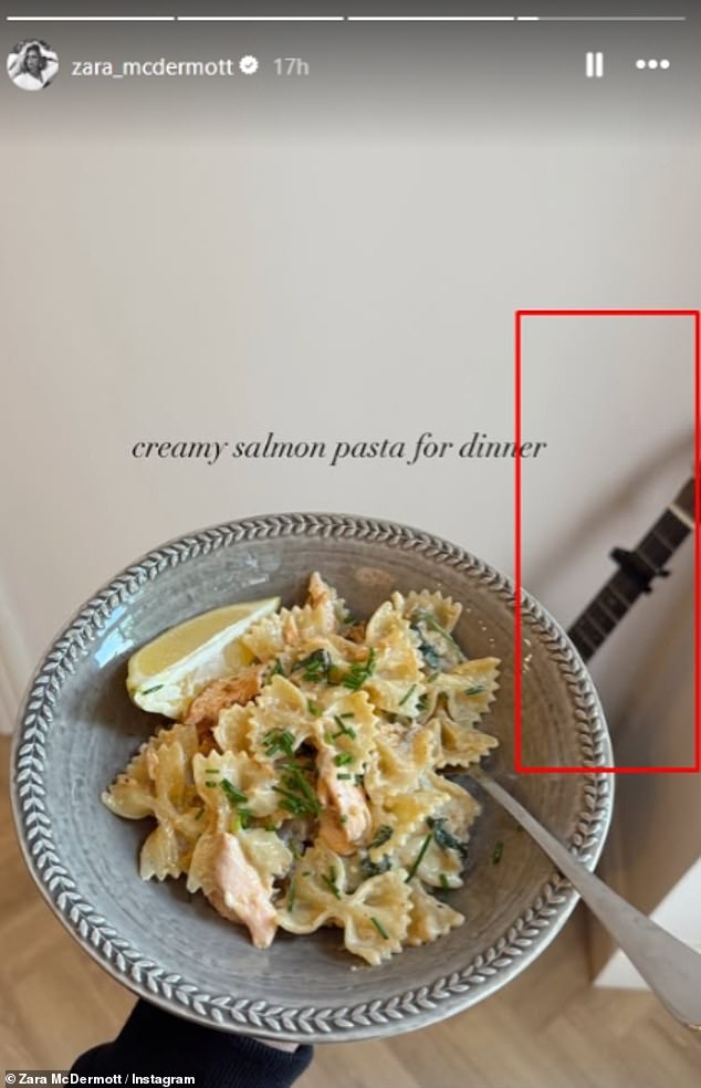 The influencer cooked the pair a 'creamy salmon pasta for dinner', as she captured the plate with the singers guitar noticeably in the background