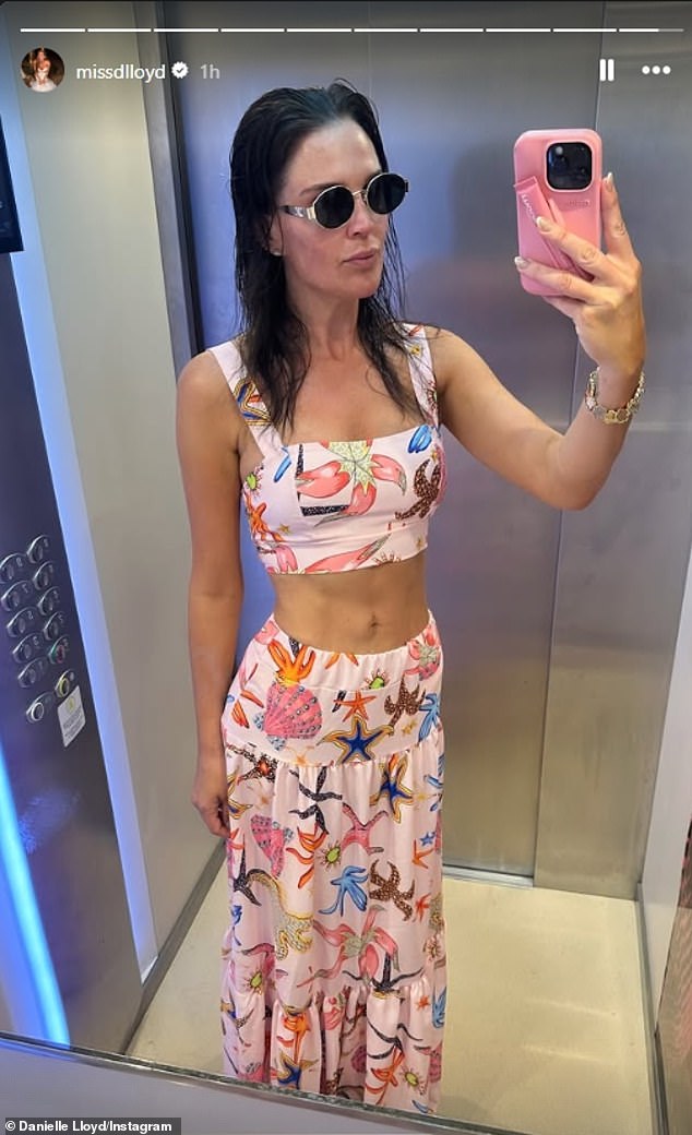 The model and TV host, 41, took to her Instagram to pose up a storm in a patterned pink crop