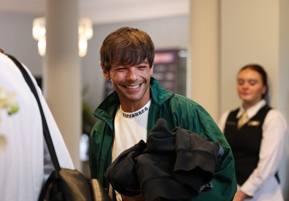Louis Tomlinson smiling at Soccer Aid for UNICEF training.