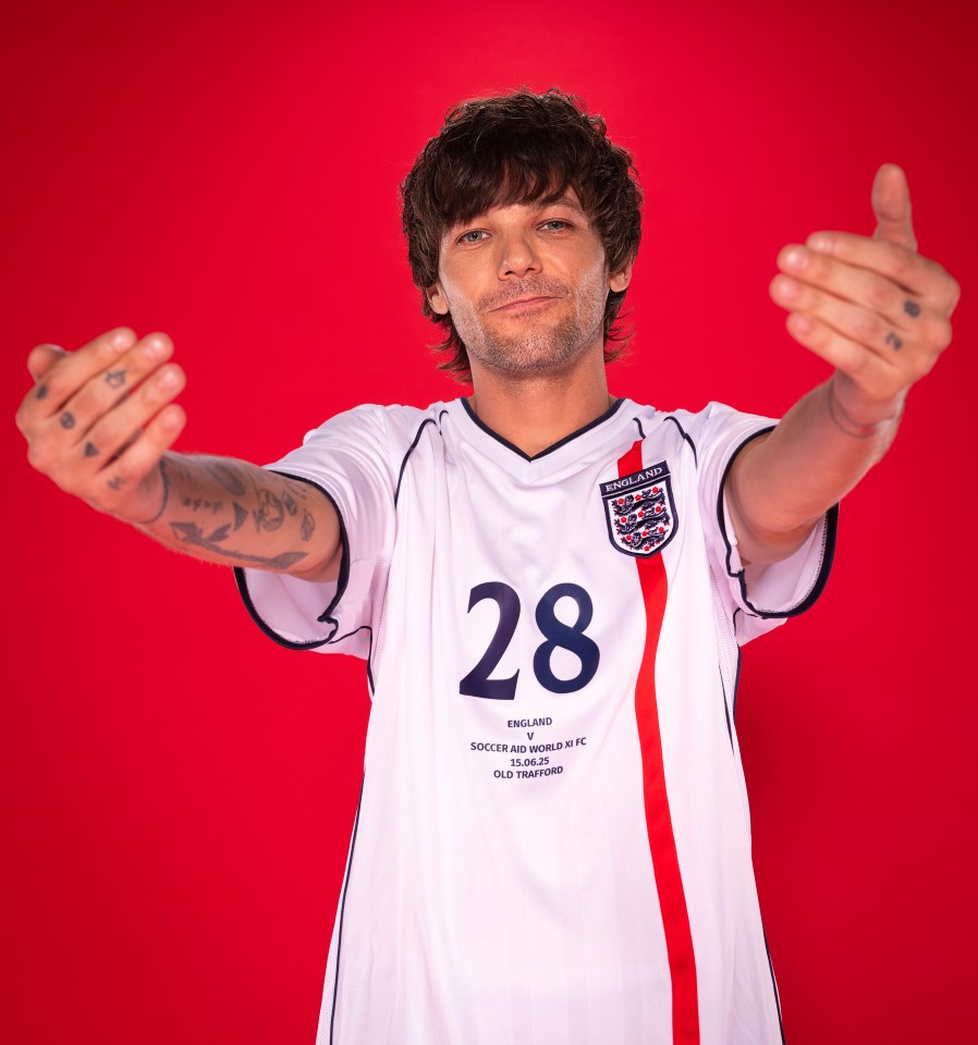 Louis Tomlinson wearing an England soccer jersey.