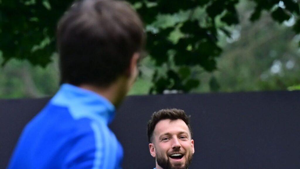Sam Thompson finally comes face to face with ex Zara's new man Louis Tomlinson as they arrive at Soccer Aid training