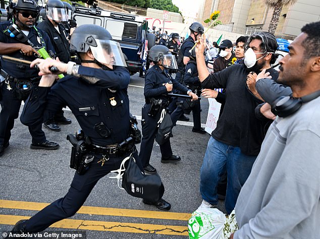 Anti-ICE protesters clash with police near the Federal Building and detention center in Los Angeles, California on June 9, 2025 amid protests over immigration raids