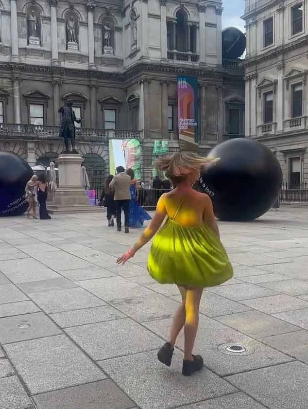 Lady Amelia Windsor gave a twirl in the courtyard of Burlington House as she arrived at the Royal Academy Summer Exhibition preview party