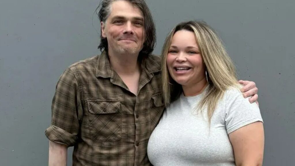 Noughties rock legend looks VERY different as he poses with pregnant YouTube star Trisha Paytas