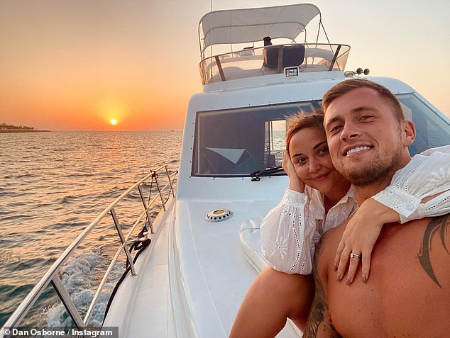 Christine's fashionable trip comes after it recently emerged that she'd he's 'exchanged flirty texts' with Dan Osbourne [Dan pictured with wife Jacqueline Jossa]