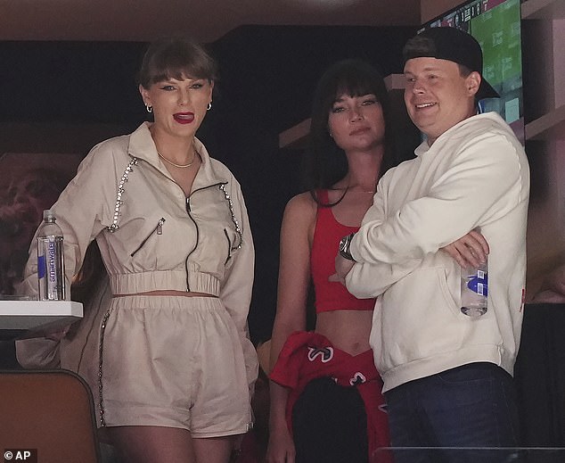 When Taylor wasn't with Travis, she was mingling with other attendees in their VIP box