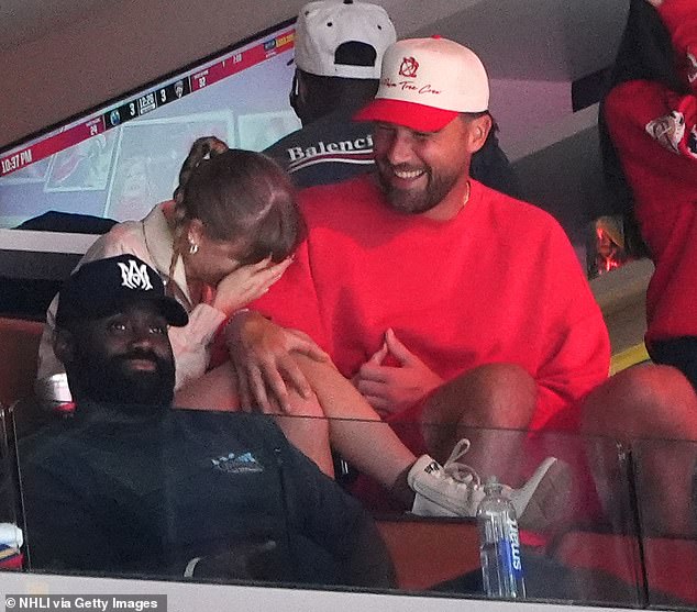 At one point during the game, Travis was seen making Taylorlaugh