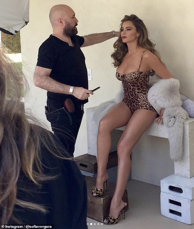 In another snap, she wowed in a leopard-print swimsuit and high heels, with her hair styled in a classic wavy blowout