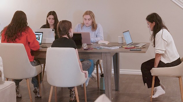 Ariel seen in her computer working hard with SOSA team members