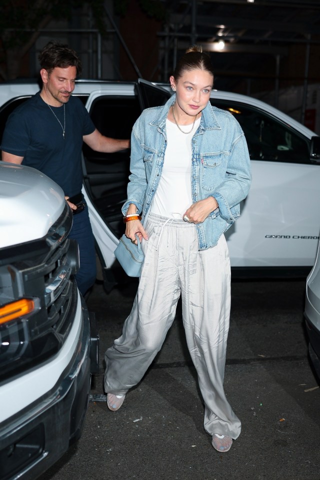 Gigi Hadid and Bradley Cooper arriving at a house in New York City.