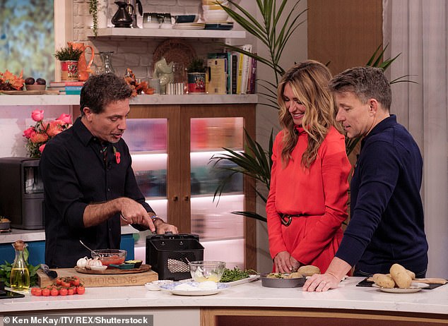 Earlier this year, an ITV investigation found there were multiple claims of 'unacceptable,' 'distressing' and 'horrendous' treatment while working with Gino over more than 12 years. (Pictured: Gino D'Acampo cooking with Cat Deeley and Ben Shephard on This Morning, October 2024)