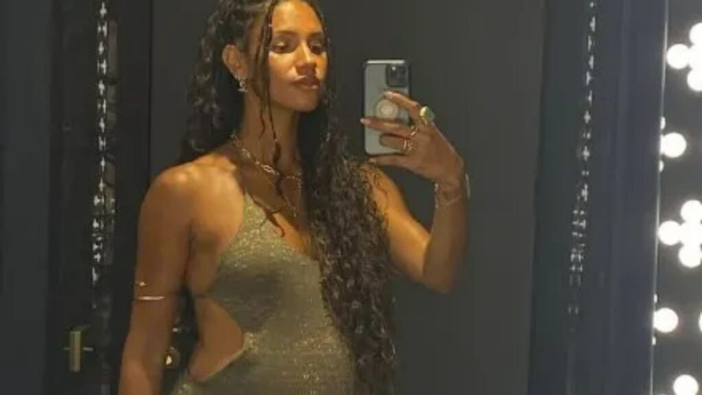 Pregnant Vick Hope shows off her baby bump in mini dress as she parties at husband Calvin Harris's Ibiza club gig