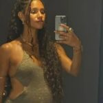 Pregnant Vick Hope shows off her baby bump in mini dress as she parties at husband Calvin Harris's Ibiza club gig