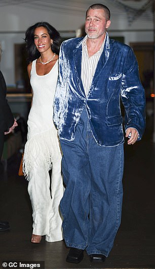 Pitt opted for head-turning look on his latest excursion and wore a vibrant, blue velvet blazer as well as a pair of loose-fitting denim jeans